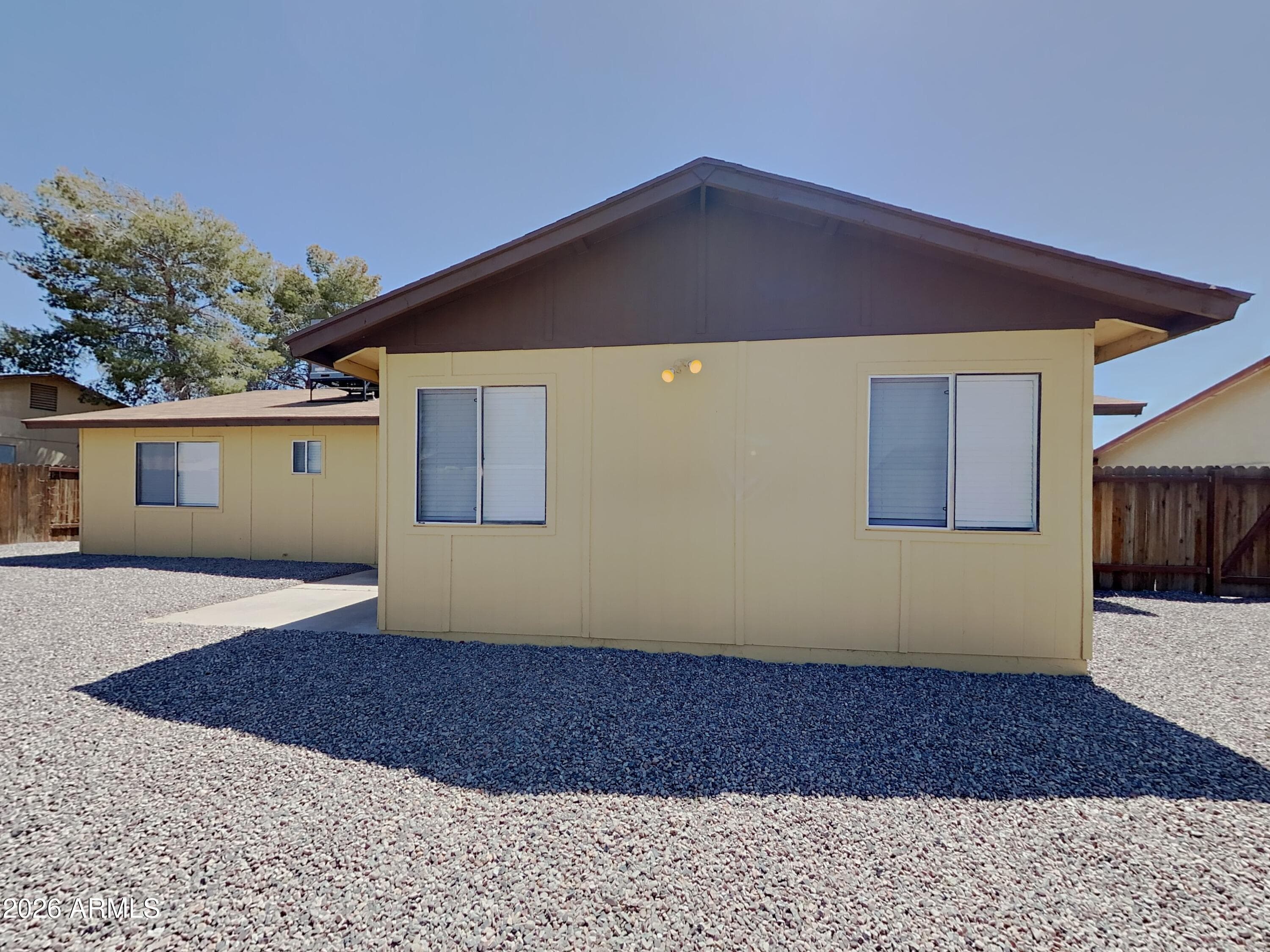 7034 W Purdue Avenue — photo 2