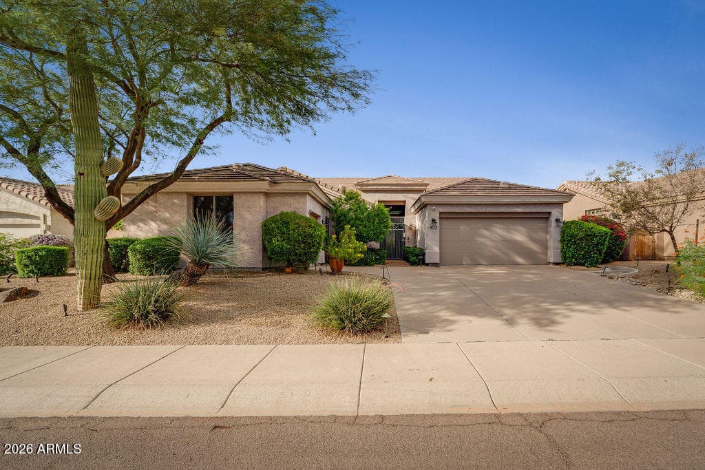 7228 E Whistling Wind Way — photo 2